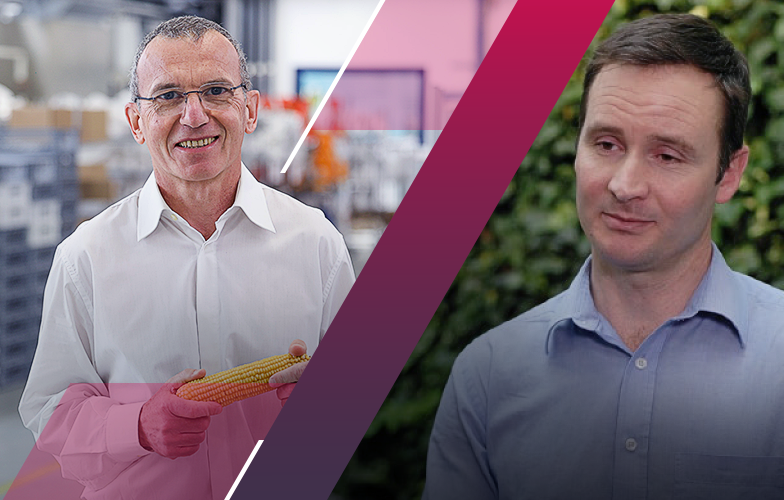 two men positioned side by side in different environments facing the camera. The one on the right holds a corn kob in a lab environment. The left one is shown in front grown corn plants.